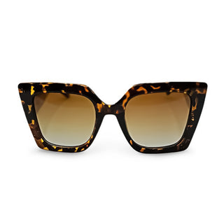 Tortoiseshell sunglasses with brown gradient lenses on a white background