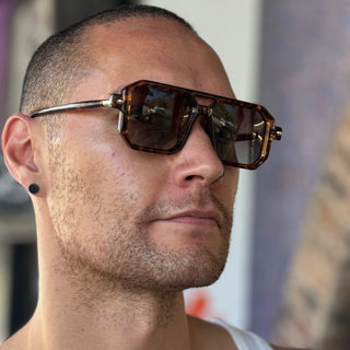 man wearing double bridge tortoise sunglasses