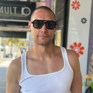 man wearing black double bridge sunglasses