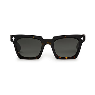Sunglasses with tortoiseshell frame and dark lenses on a white background
