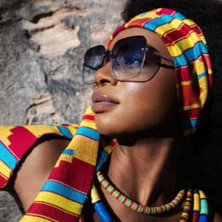 Female wearing ELIO Storm Blue Square Metal Frame UV400 Sunglasses and african scarf