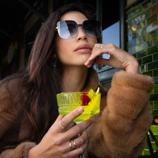 model wearing Blue Square Metal Frame drinking cocktail