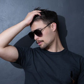 man wearing back aviator sunglasses