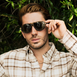 man wearing tortoiseshell aviators
