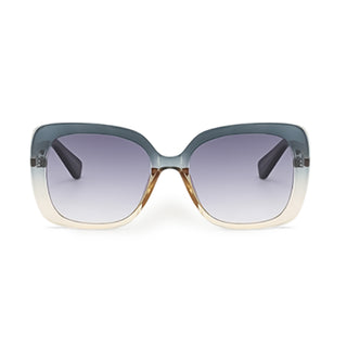 Sunglasses with a blue grey frame and gradient lens on a white background