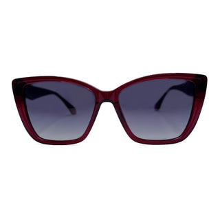 Sunglasses with red frame and dark lenses on a white background