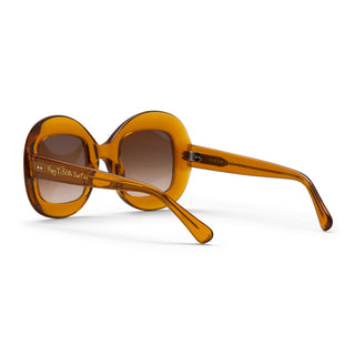 Brown sunglasses with a gradient lens on a white background