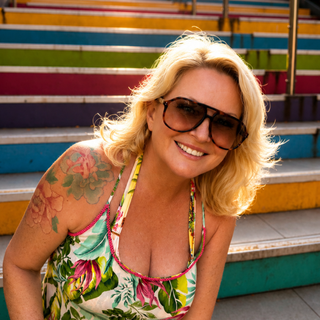 Lady wearing Tortoiseshell Acetate double bridge Aviator Sunglasses with soft Brown gradient UV400 lenses.