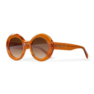 Orange sunglasses with a gradient lens on a white background