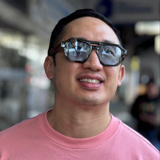 man wearing blue lens sunglasses