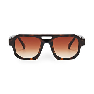 Sunglasses with tortoiseshell frame and brown gradient lenses on a white background