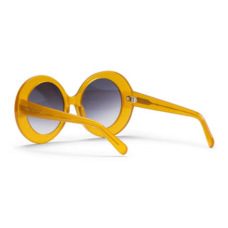 Yellow sunglasses with a white background