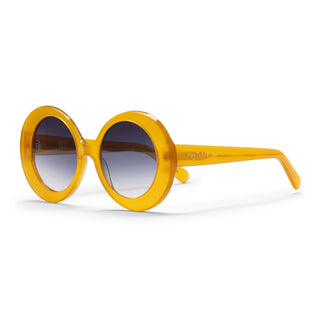 Yellow sunglasses with a gradient lens on a white background