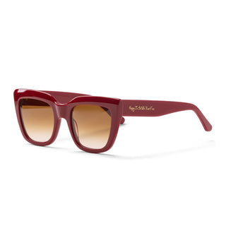 Red sunglasses with brown gradient lenses on a white background