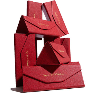 Set of red envelopes with gold text on a white background