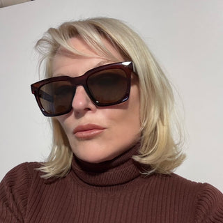 brown sunglsses on blonde woman