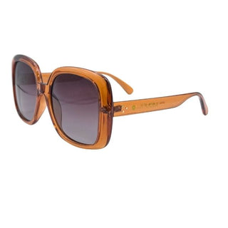 Sunglasses with orange frame and dark lenses on a white background