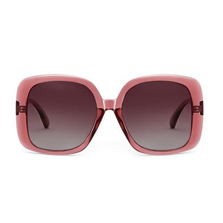 Pink sunglasses with dark lenses on a white background