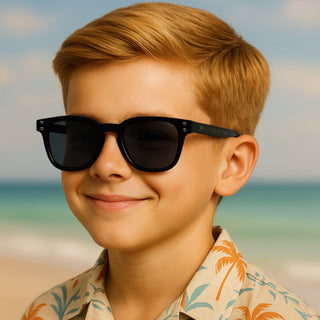child wearing black sunglasses