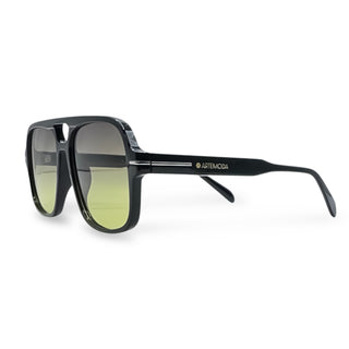 Black sunglasses with a gradient green lens on a white background