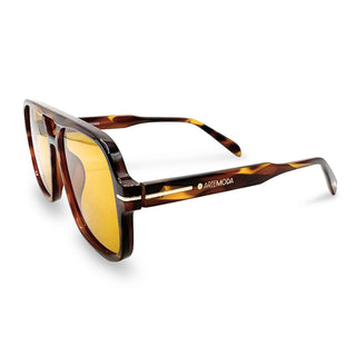 Sunglasses with tortoiseshell frame and yellow lenses on a white background