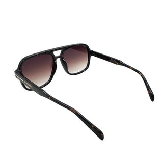 Dark tortoiseshell sunglasses with gradient lenses on a white background
