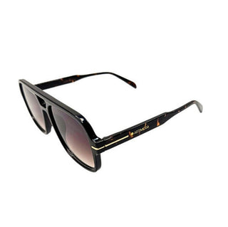 tortoiseshell sunglasses with a gradient lens on a white background