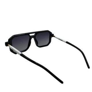 Black sunglasses with dark lenses on a white background