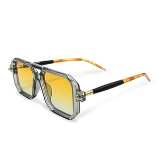 Sunglasses with yellow gradient lenses and transparent frame on a white background