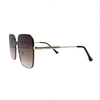 Sunglasses with gradient lenses and gold frame on a white background