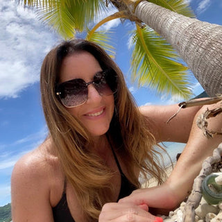 woman on each wearing oversized sunglasses