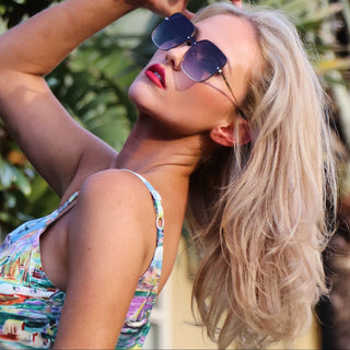 woman with oversized sunglasses