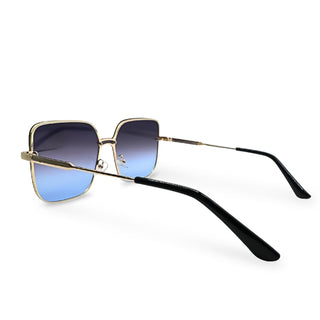 Sunglasses with gold frame and black arms on a white background