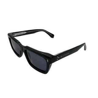 Black sunglasses with a brand logo on a white background