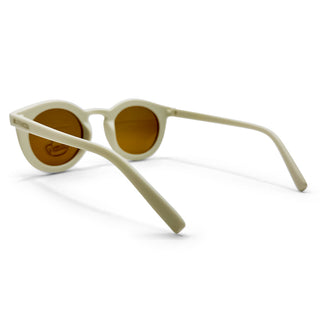 Sunglasses with beige frame and brown lenses on a white background