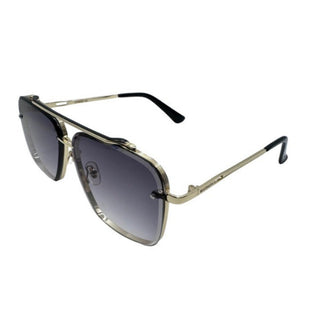 Sunglasses with gold frame and grey gradient lenses on a white background