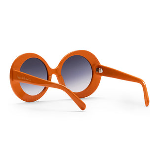 Orange sunglasses with a gradient lens on a white background