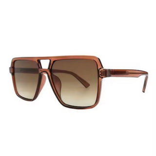 Brown sunglasses with a white background