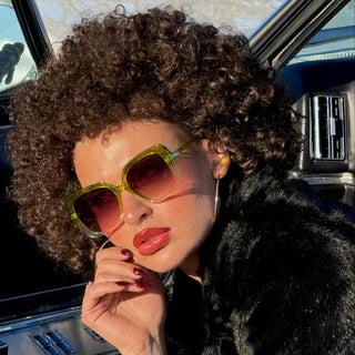 Person with green sunglasses 