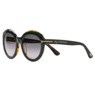 Sunglasses with green and tortoiseshell frame on a white background